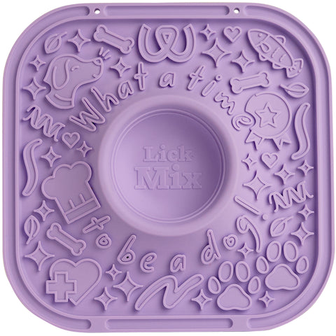 Purple pet mat with decorative designs and text, featuring the phrase 'Lick Mix'.