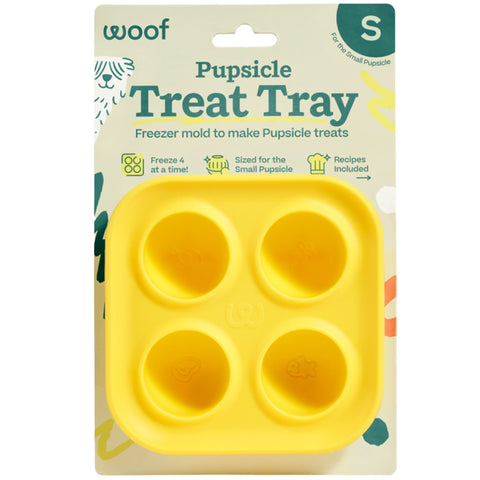 Yellow pupsicle treat tray packaging with 'woof' branding on a beige background